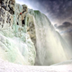 Illustration for article titled Watch a man ice climb a frozen Niagara Falls for the first time ever